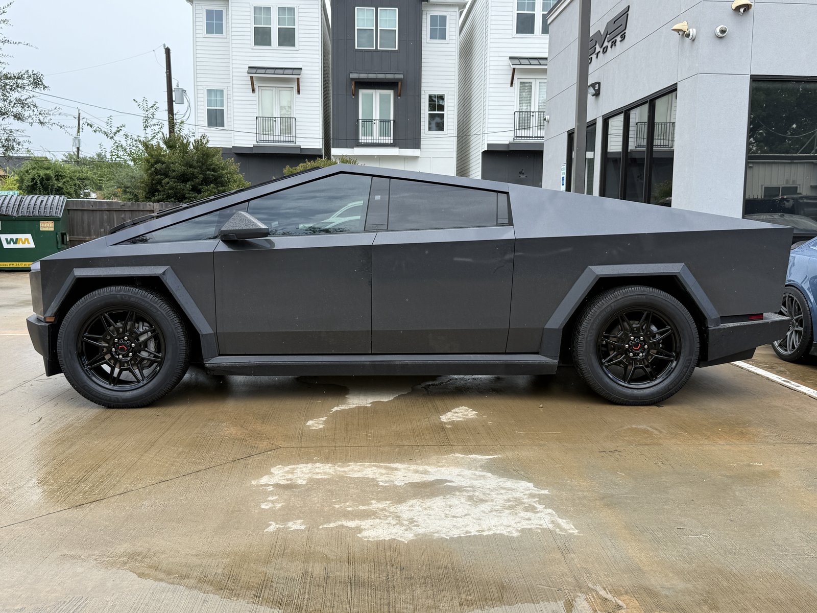 Matte dark gray Cybertruck wrap with tint and wheels at EVS Motors Houston