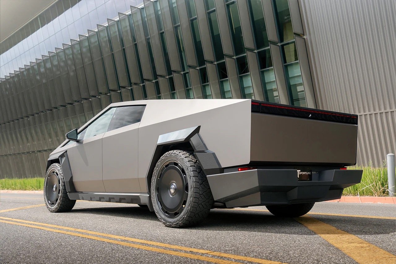 Matte dark grey wrapped Cybertruck with widebody flares, T Sportline aero wheels, Falcon Wildpeak AT tires and aftermarket bumper at EVS Motors