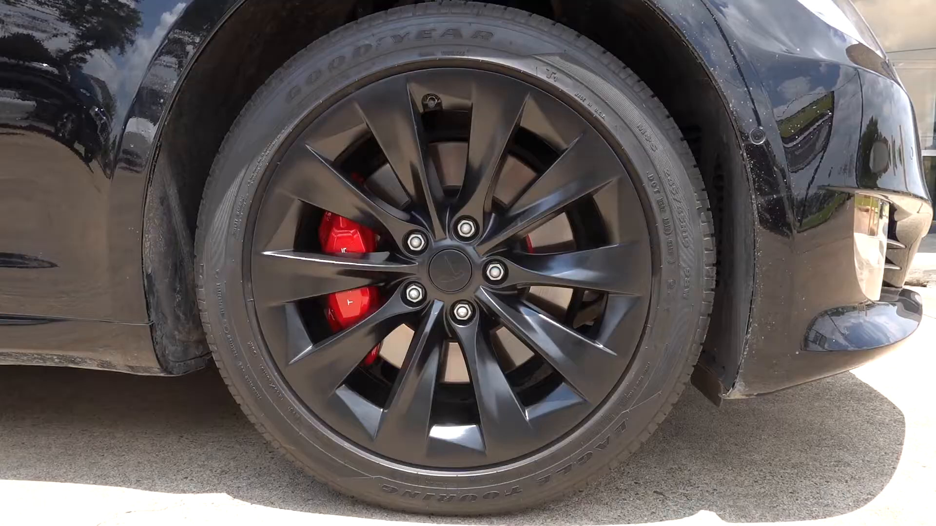 Brake caliper painted red on a Tesla Model S