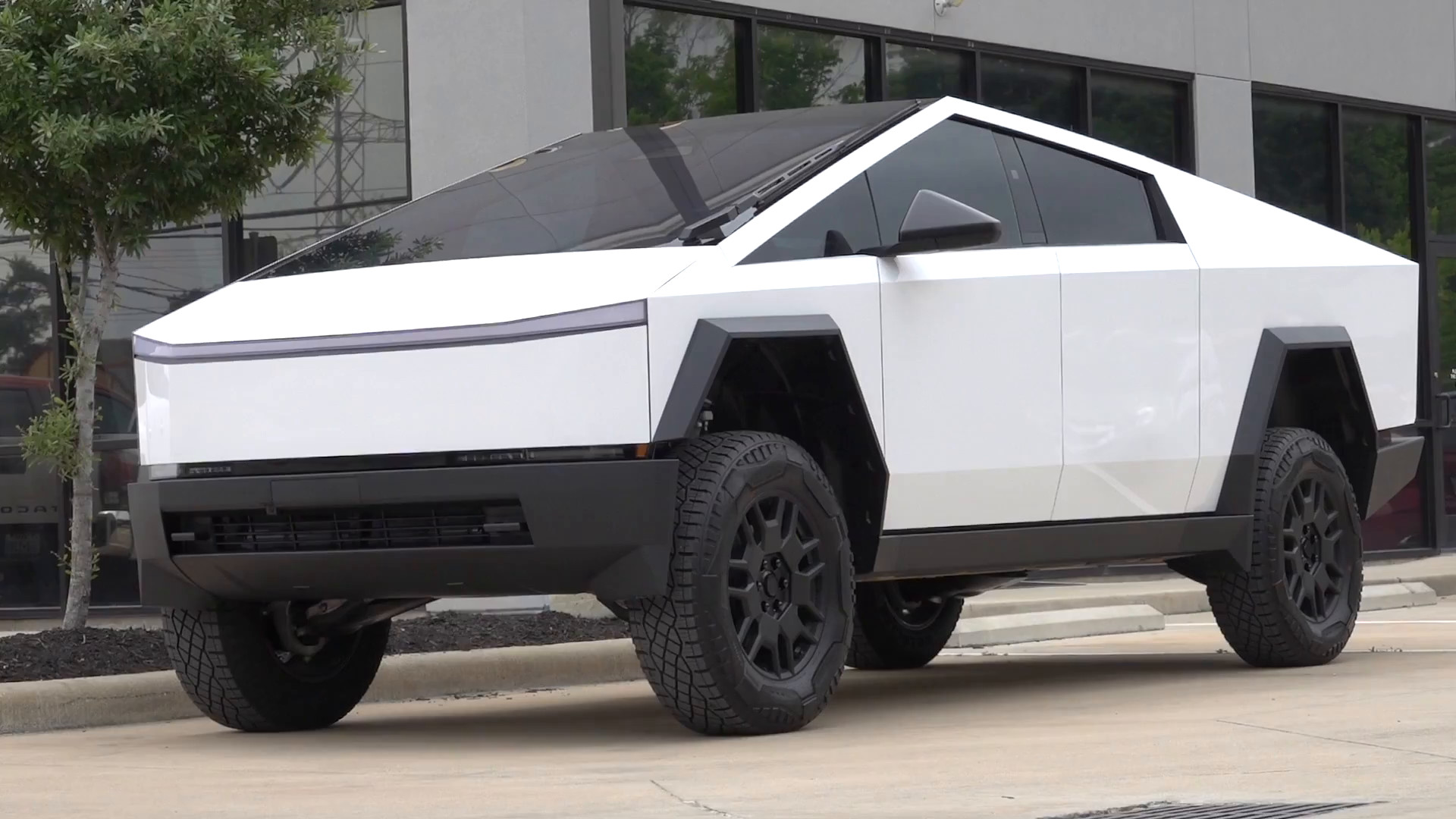 Tesla Cybertruck in gloss white Inozetek vinyl wrap at EVS Motors