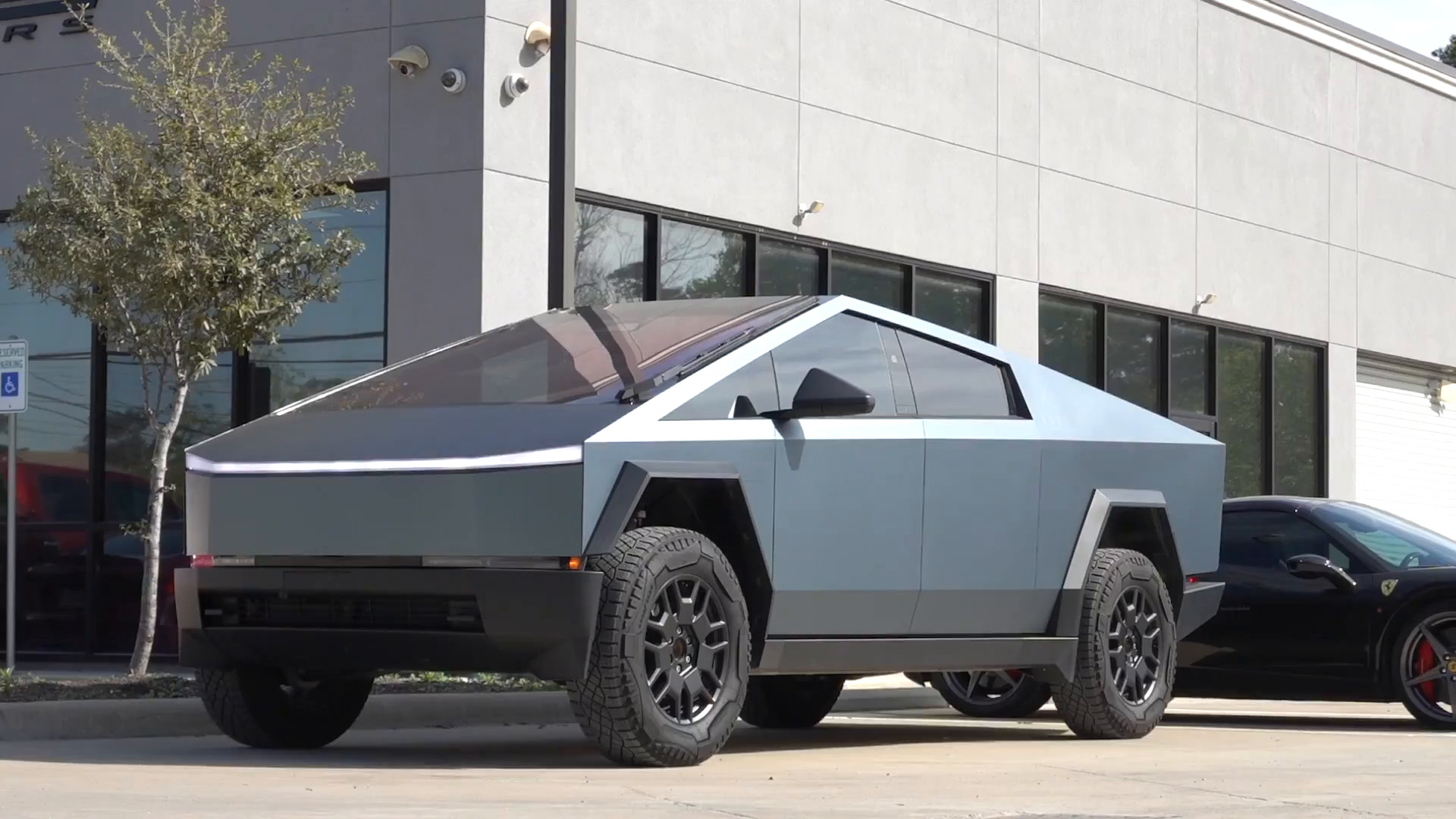 Tesla Cybertruck wrapped in matte blue Inozetek vinyl at EVS Motors in Houston