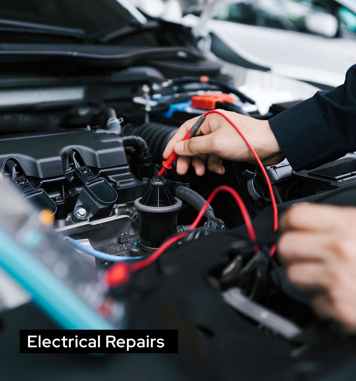 Car Mechanic Servicing Car Engine