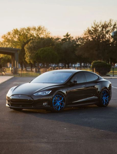 EVS Black Tesla In Parking Lot