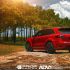 Prior Design aero kit for a red Porsche, angled rear view